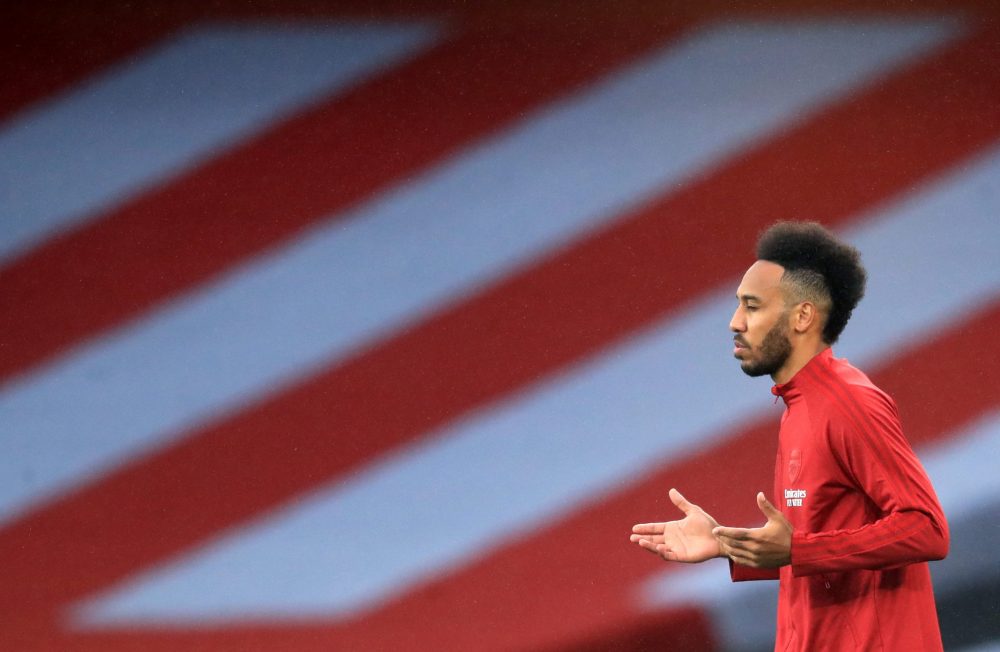 Arsenal's Gabonese striker Pierre-Emerick Aubameyang runs on to the pitch ahead of the English Premier League football match between Arsenal and Leicester City at the Emirates Stadium in London on July 7, 2020. (Photo by Adam Davy / POOL / AFP)