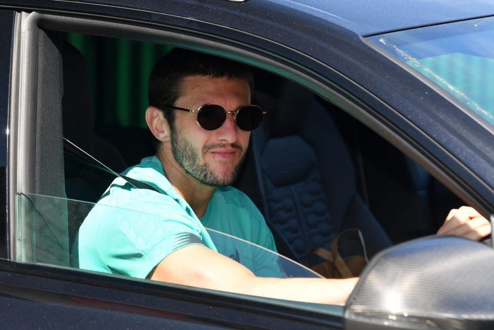 Liverpool's English midfielder Adam Lallana leaves from Melwood in Liverpool, north west England to resume training on May 20, 2020, as training re...