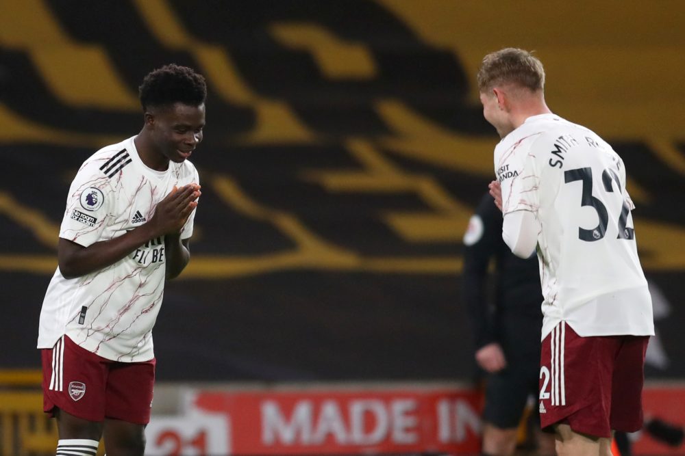 Arsenal's English striker Bukayo Saka (L) celebrates with Arsenal's English midfielder Emile Smith Rowe before his goal is disallowed during the En...