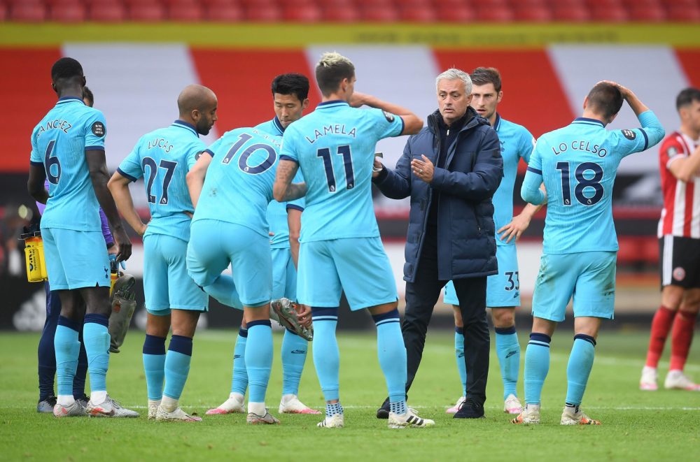 SHEFFIELD, ENGLAND - JULY 02: Jose Mourinho, Manager of Tottenham Hotspur speaks to Erik Lamela of Tottenham Hotspur during a water break during the Premier League match between Sheffield United and Tottenham Hotspur at Bramall Lane on July 02, 2020 in Sheffield, England. Football Stadiums around Europe remain empty due to the Coronavirus Pandemic as Government social distancing laws prohibit fans inside venues resulting in all fixtures being played behind closed doors. (Photo by Michael Regan/Getty Images)