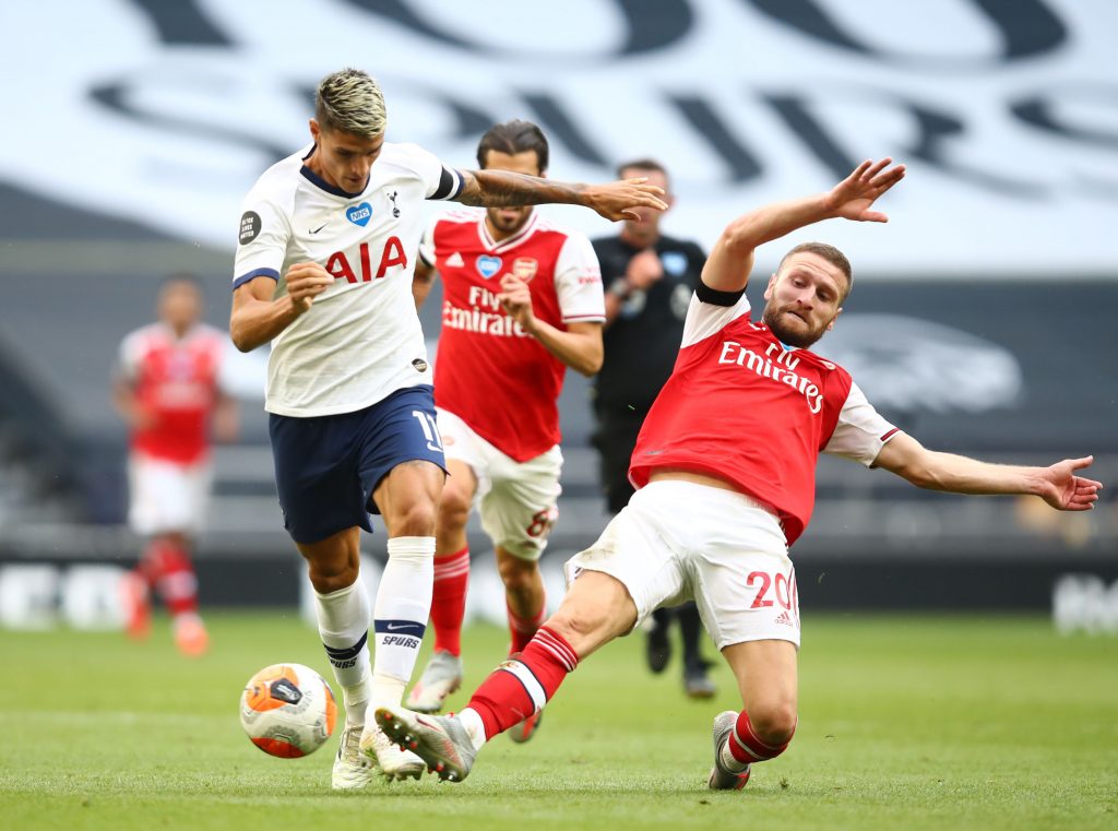 Saka to start: Predicted Arsenal lineup vs Liverpool 4 LONDON, ENGLAND - JULY 12: Erik Lamela of Tottenham Hotspur battles for possession with Shkodran Mustafi of Arsenal during the Premier League match between Tottenham Hotspur and Arsenal FC at Tottenham Hotspur Stadium on July 12, 2020 in London, England. Football Stadiums around Europe remain empty due to the Coronavirus Pandemic as Government social distancing laws prohibit fans inside venues resulting in all fixtures being played behind closed doors. (Photo by Julian Finney/Getty Images)