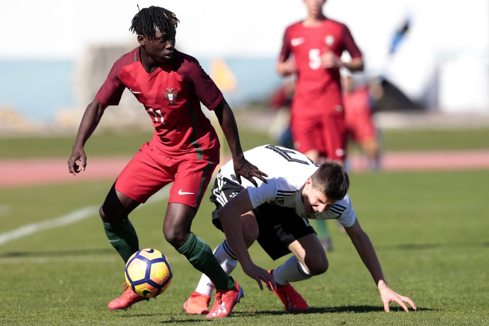 VILA REAL SANTO ANTONIO, PORTUGAL - FEBRUARY 11: Michael Kostka (R) of Germany U16 challenges Joelson Fernandes (L) of Portugal U16 during UEFA Dev...