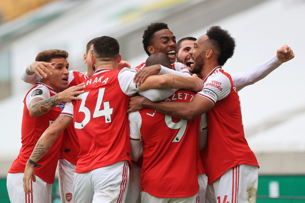 Arteta: Why would I want to lose a player like Lacazette? 3 WOLVERHAMPTON, ENGLAND - JULY 04: Alexandre Lacazette of Arsenal (obscured) celebrates with teammates after scoring his team's second goal during the Premier League match between Wolverhampton Wanderers and Arsenal FC at Molineux on July 04, 2020 in Wolverhampton, England. Football Stadiums around Europe remain empty due to the Coronavirus Pandemic as Government social distancing laws prohibit fans inside venues resulting in all fixtures being played behind closed doors. (Photo by Mike Egerton/Pool via Getty Images)