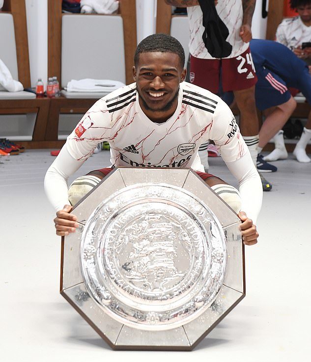 Ainsley Maitland-Niles says goodbye to Arsenal fans 4 Ainsley Maitland-Niles poses with the FA Community Shield (Photo via Arsenal / Getty Images)
