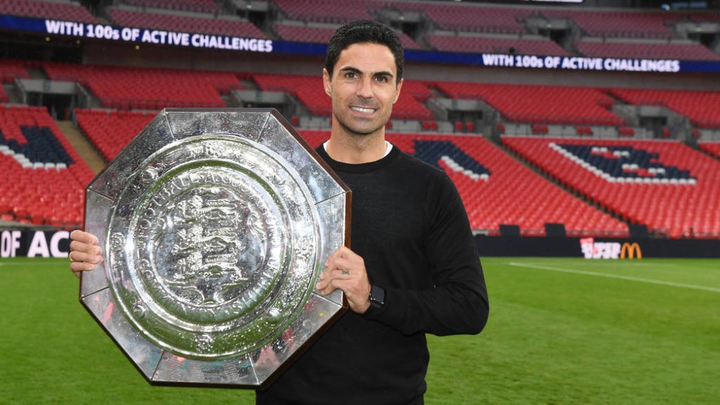 LONDON, ENGLAND - AUGUST 29: Arsenal Head Coach Mikel Arteta with the Community Shield after the FA Community Shield match between Arsenal and Liverpool at Wembley Stadium on August 29, 2020 in London, England. (Photo by Stuart MacFarlane/Arsenal FC via Getty Images)