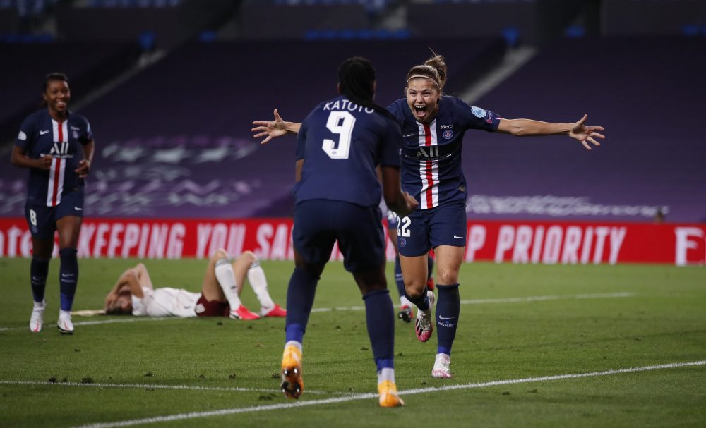 SAN SEBASTIAN, SPAIN - AUGUST 22: Signe Bruun of Paris Saint-Germain celebrates with teammate Marie-Antoinette Katoto after scoring her team's second goal during the UEFA Women's Champions League Quarter Final between Arsenal FC Women and Paris Saint-Germain Women at Estadio Anoeta on August 22, 2020 in San Sebastian, Spain. (Photo by Clive Brunskill/Getty Images)