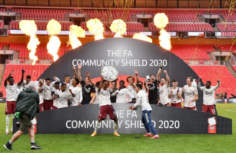 LONDON, ENGLAND - AUGUST 29: Pierre-Emerick Aubameyang of Arsenal lifts the Community Shield Trophy following his team's victory in during the FA Community Shield final between Arsenal and Liverpool at Wembley Stadium on August 29, 2020 in London, England. (Photo by Justin Tallis/ pool via Getty Images)