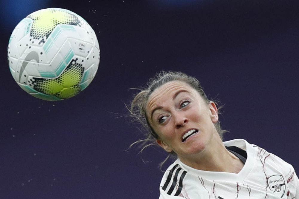 Arsenal's Scottish forward Lisa Evans goes for a header during the UEFA Women's Champions League quarter-final football match between Arsenal and P...