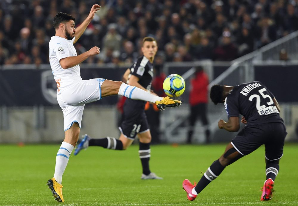 Arsenal contact Marseille and €30m player's entourage 3 Morgan Sanson (L) fights for the ball with Bordeaux's French defender Enock Kwateng during the French L1 football match between Girondins de Bordeaux and Olympique de Marseille (OM) at the Matmut-Atlantique stadium in Bordeaux, southwestern France on February 2, 2020. (Photo by NICOLAS TUCAT / AFP)