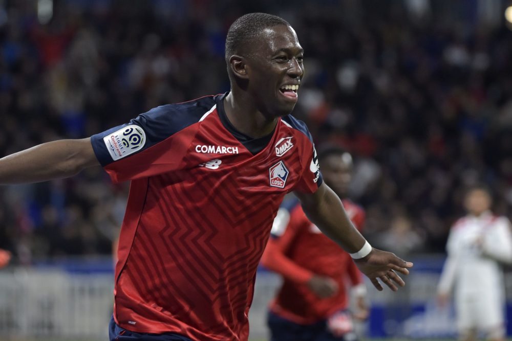 Lille's French midfielder Boubakary Soumare celebrates after scoring a goal during the French L1 football match between Olympique Lyonnais (OL) and...