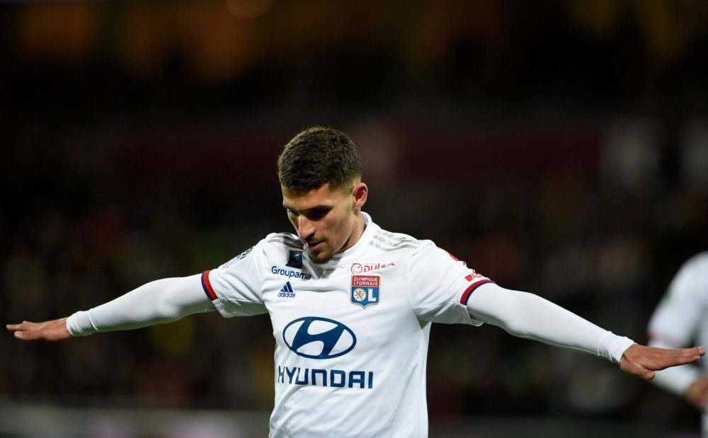 Lyon's French midfielder Houssem Aouar celebrates after scoring a goal during the French L1 football match between FC Metz and Olympique Lyonnais a...