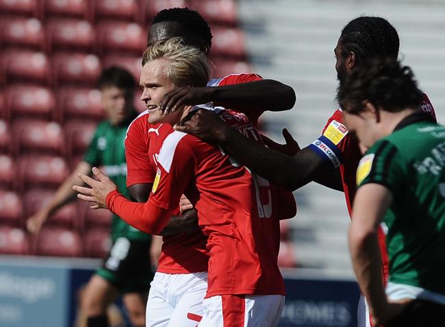 Matt Smith celebrates scoring on the opening day of the season against Rochdale (Picture: Dave Evans)