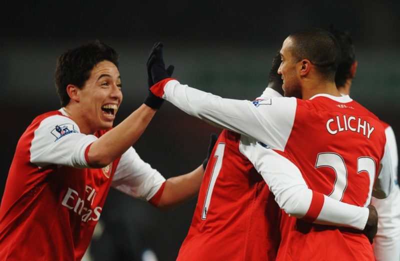 LONDON, UNITED KINGDOM - MARCH 02: Gael Clichy (R) of Arsenal celebrates with team mate Samir Nasri (L) after scoring his sides fifth goal during t...