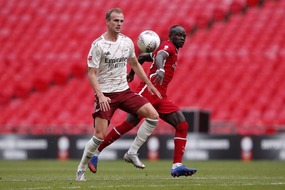 LONDON, ENGLAND - AUGUST 29: Sadio Mane of Liverpool battles for possession with Rob Holding of Arsenal during the FA Community Shield final betwee...
