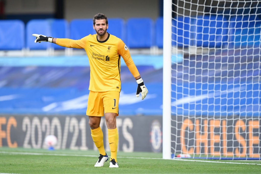 Liverpool hit by Covid and AFCON ahead of Arsenal clash 2 LONDON, ENGLAND - SEPTEMBER 20: Alisson Becker of Liverpool in action during the Premier League match between Chelsea and Liverpool at Stamford Bridge on September 20, 2020 in London, England. (Photo by Michael Regan/Getty Images)