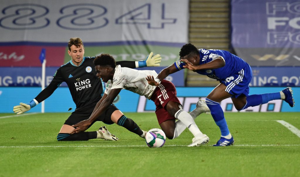 Leicester City's Ghanaian midfielder Daniel Amartey (R) vie with Arsenal's English striker Bukayo Saka (C) during the English League Cup third round football match between Leicester City and Arsenal at King Power Stadium in Leicester, central England on September 23, 2020. (Photo by RUI VIEIRA/POOL/AFP via Getty Images)