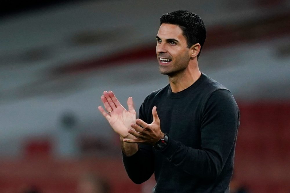 Arsenal's Spanish manager Mikel Arteta reacts on the touchline during the English Premier League football match between Arsenal and West Ham United...