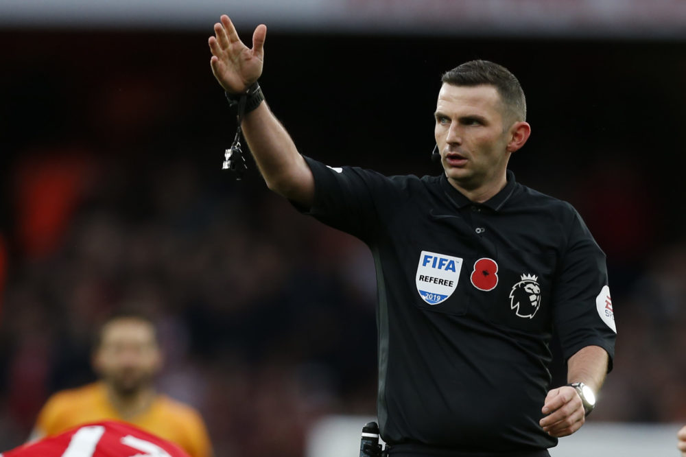 Referee Michael Oliver gestures during the English Premier League football match between Arsenal and Wolverhampton Wanderers at the Emirates Stadiu...