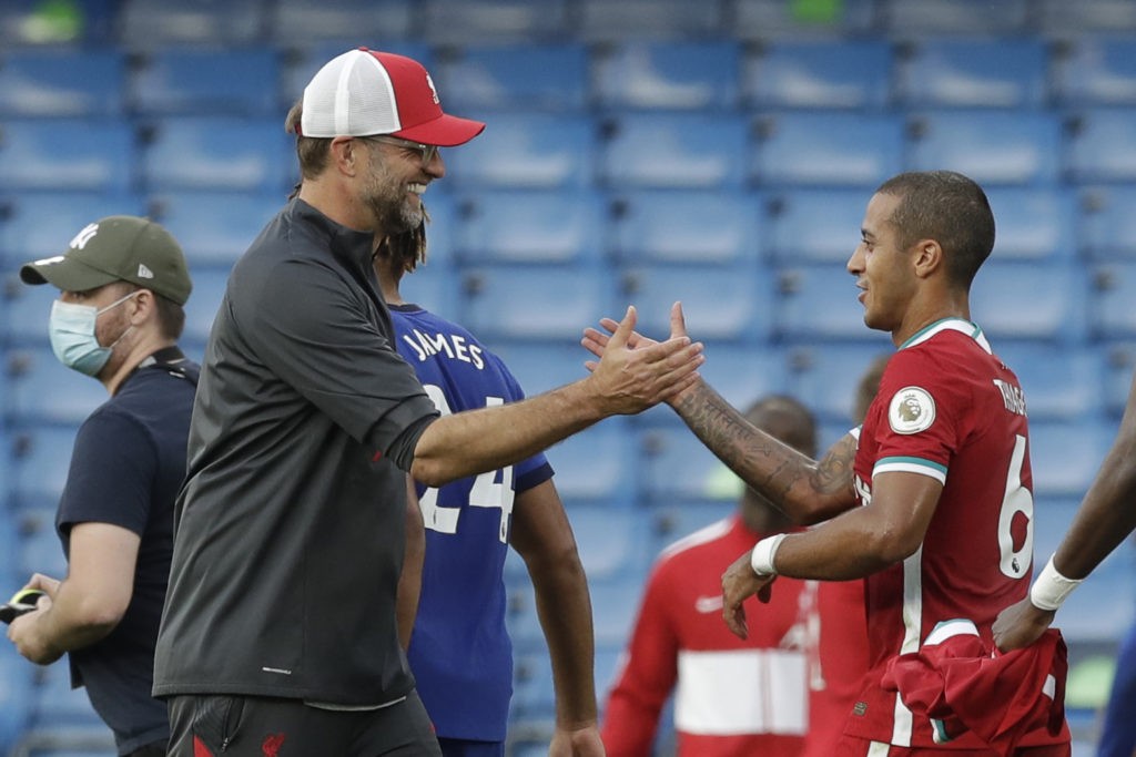 Liverpool requested Arsenal postponement before receiving faulty positives 2 Liverpool's German manager Jurgen Klopp (L) greets Liverpool's Spanish midfielder Thiago Alcantara after winning the English Premier League football match between Chelsea and Liverpool at Stamford Bridge in London on September 20, 2020. (Photo by Matt Dunham / POOL / AFP)