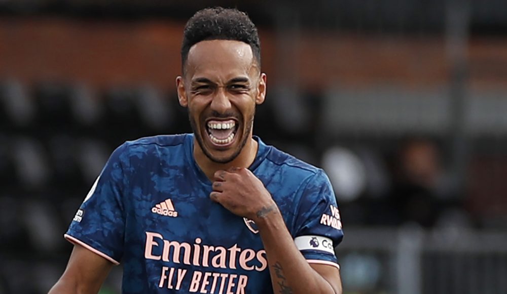 Arsenal's Gabonese striker Pierre-Emerick Aubameyang celebrates scoring their third goal during the English Premier League football match between F...