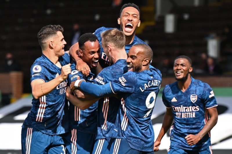 Arsenal's Brazilian defender Gabriel (2L) celebrates with team-mates after scoring their second goal during the English Premier League football match between Fulham and Arsenal at Craven Cottage in London on September 12, 2020. (Photo by Ben STANSALL / POOL / AFP)