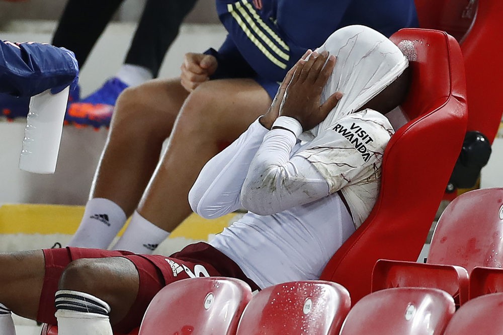 Arsenal's French striker Alexandre Lacazette reacts after being substituted off during the English Premier League football match between Liverpool and Arsenal at Anfield in Liverpool, north west England on September 28, 2020. (Photo by JASON CAIRNDUFF / POOL / AFP)