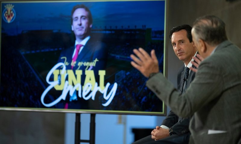 Villarreal's new Spanish coach Unai Emery (L) listens to Villarreal's president Fernando Roig during his official presentation at la Ceramica Stadi...