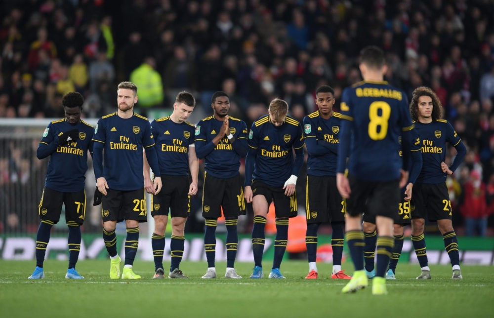 LIVERPOOL, ENGLAND - OCTOBER 30: Dani Ceballos of Arsenal is walks back to his teammates after having his penalty saved in the shoot-out during the...