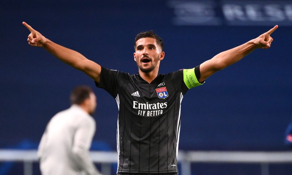LISBON, PORTUGAL - AUGUST 15: Houssem Aouar of Olympique Lyon celebrates following his team's victory in the UEFA Champions League Quarter Final ma...