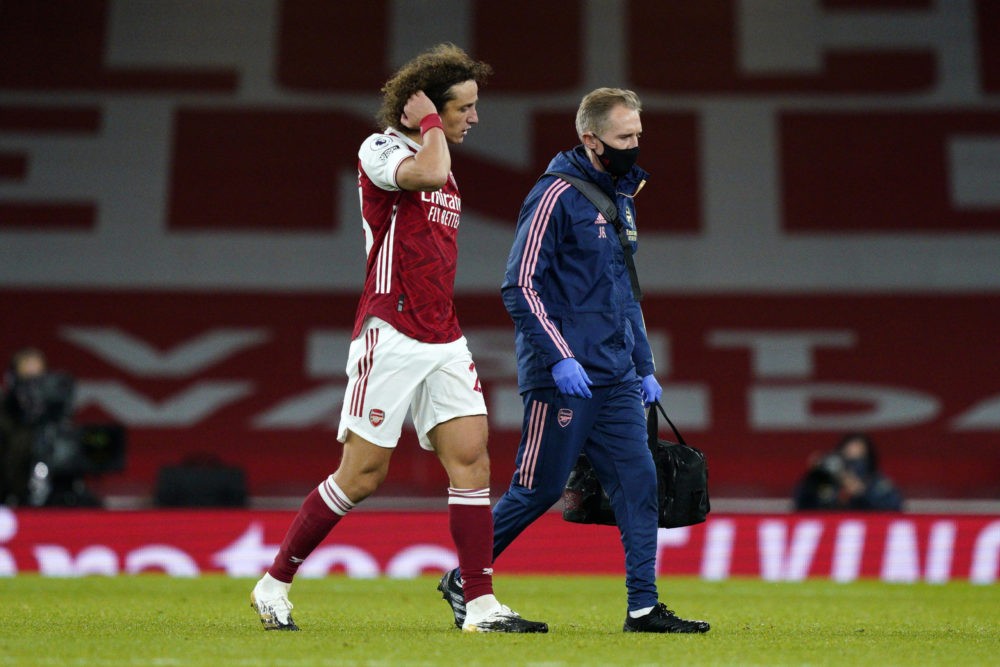 LONDON, ENGLAND: David Luiz of Arsenal leaves the pitch injured during the Premier League match between Arsenal and Leicester City at Emirates Stad...