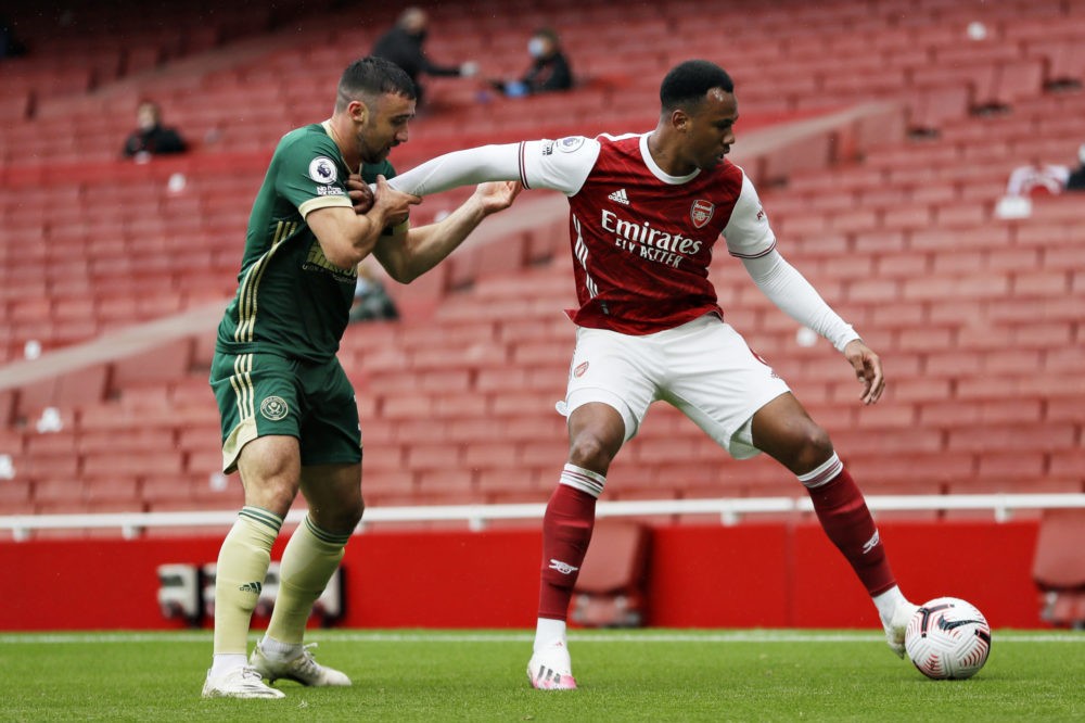 Can Arsenal finish 4th and secure Champions League qualification? 4 LONDON, ENGLAND - OCTOBER 04: Gabriel of Arsenal holds off Enda Stevens of Sheffield United during the Premier League match between Arsenal and Sheffield United at Emirates Stadium on October 04, 2020 in London, England. (Photo by Kirsty Wigglesworth - Pool/Getty Images)