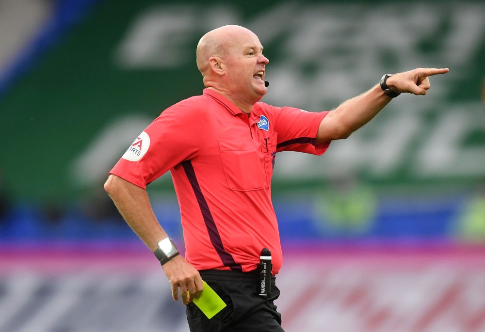 VAR for Arsenal vs Sheffield United same as for Liverpool defeat 3 LIVERPOOL, ENGLAND - JULY 09: Referee Lee Mason reaches for his yellow card during the Premier League match between Everton FC and Southampton FC at Goodison Park on July 09, 2020 in Liverpool, England. Football Stadiums around Europe remain empty due to the Coronavirus Pandemic as Government social distancing laws prohibit fans inside venues resulting in all fixtures being played behind closed doors. (Photo by Michael Regan/Getty Images)