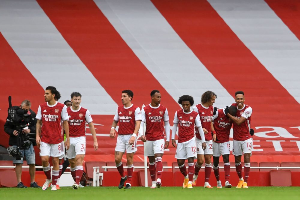 Arsenal's French-born Ivorian midfielder Nicolas Pepe (2nd R) celebrates scoring his team's second goal with Arsenal's Gabonese striker Pierre-Emerick Aubameyang (R) during the English Premier League football match between Arsenal and Sheffield United at the Emirates Stadium in London on October 4, 2020. (Photo by NEIL HALL / POOL / AFP)