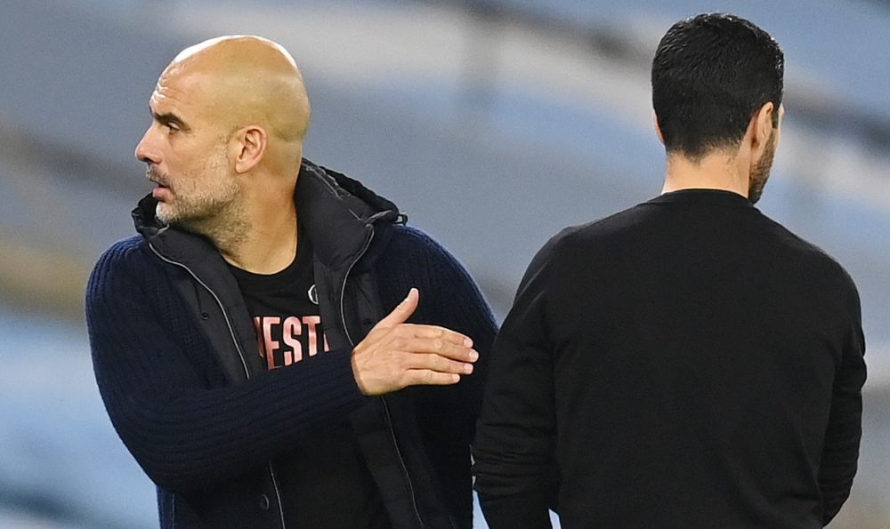 Manchester City's Spanish manager Pep Guardiola (L) and Arsenal's Spanish manager Mikel Arteta after the English Premier League football match betw...