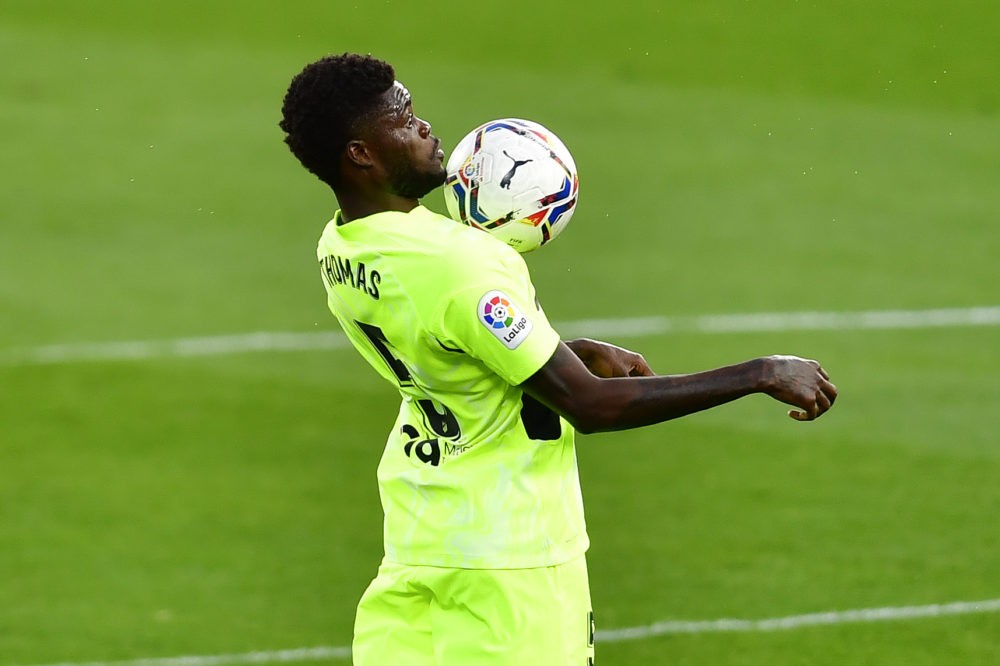 Atletico Madrid' Ghana midfielder Thomas Partey controls the ball during the Spanish league football match SD Huesca against Club Atletico de Madri...