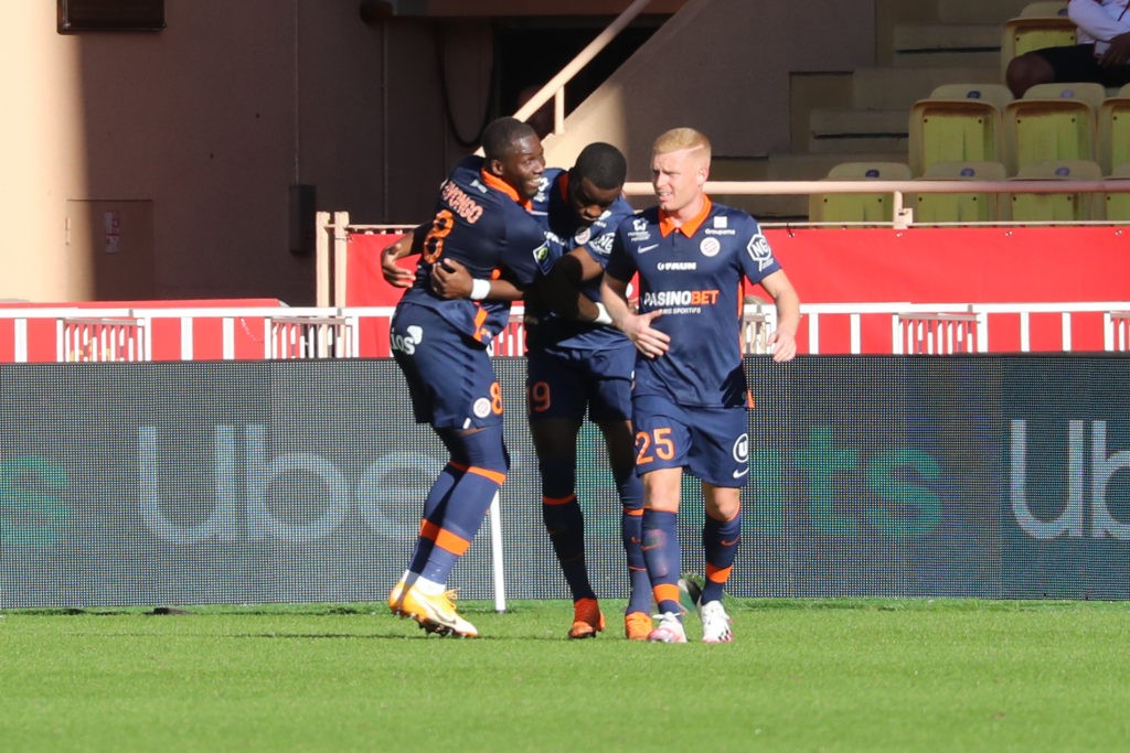 Montpellier's Stephy Mavididi (C) celebrates after scoring a goal during the French L1 football match between AS Monaco vs Montpellier Herault SC at the "Louis II Stadium" in Monaco on October 18, 2020. (Photo by VALERY HACHE/AFP via Getty Images)