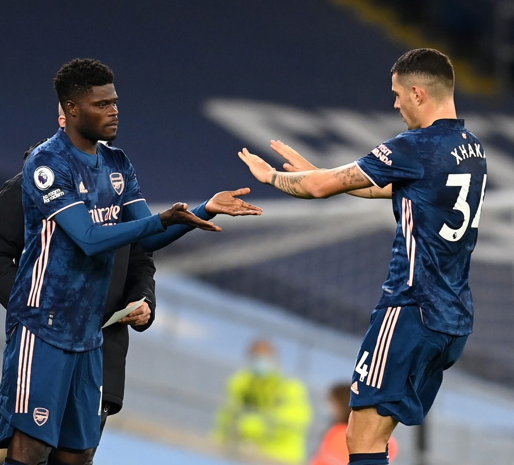 MANCHESTER, ENGLAND - OCTOBER 17: Thomas Partey of Arsenal is substituted on for Granit Xhaka of Arsenal during the Premier League match between Manchester City and Arsenal at Etihad Stadium on October 17, 2020 in Manchester, England. Sporting stadiums around the UK remain under strict restrictions due to the Coronavirus Pandemic as Government social distancing laws prohibit fans inside venues resulting in games being played behind closed doors. (Photo by Michael Regan/Getty Images)