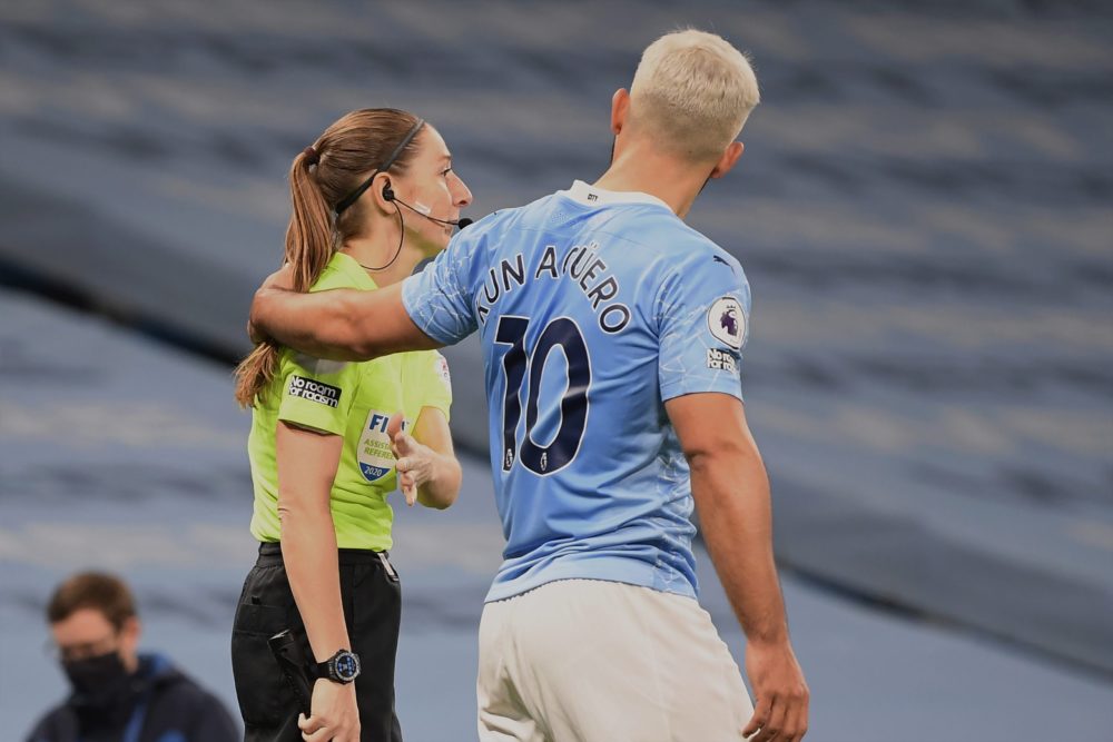 MANCHESTER, ENGLAND - OCTOBER 17: Assistant referee Sian Massey-Ellis and Sergio Aguero of Manchester City during the Premier League match between Manchester City and Arsenal at Etihad Stadium on October 17, 2020 in Manchester, England. Sporting stadiums around the UK remain under strict restrictions due to the Coronavirus Pandemic as Government social distancing laws prohibit fans inside venues resulting in games being played behind closed doors. (Photo by Michael Regan/Getty Images)