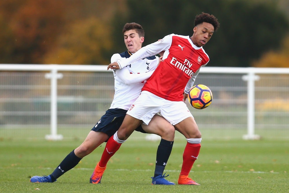 ENFIELD, ENGLAND - NOVEMBER 18: Joe Muscatt of Tottenham Hotspur puts pressure on Chris Willock of Arsenal during the Premier League 2 match betwee...
