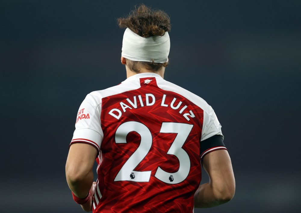 Arsenal's Brazilian defender David Luiz is seen with his head bandaged during the English Premier League football match between Arsenal and Wolverh...