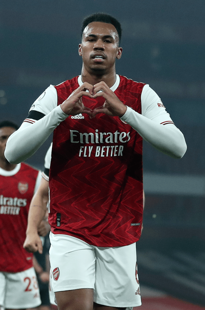 Arsenal's Brazilian defender Gabriel celebrates scoring the equalising goal to make it 1-1 during the English Premier League football match between...