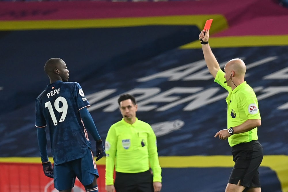 Ready to sell Pepe, Martinelli's father speaks and new Kroenke purchase 3 Arsenal's French-born Ivorian midfielder Nicolas Pepe (L) is shown a red card by atch Referee Anthony Taylor (R) during the English Premier League football match between Leeds United and Arsenal at Elland Road in Leeds, northern England on November 22, 2020. (Photo by Paul ELLIS / POOL / AFP)