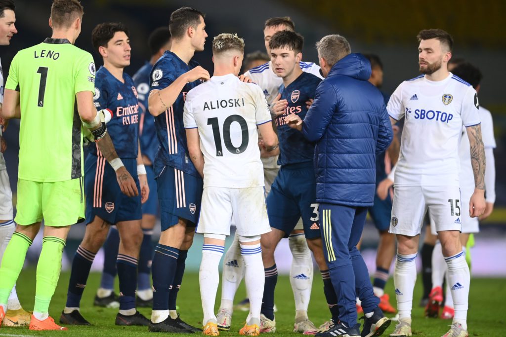 Leeds United's Macedonian midfielder Ezgjan Alioski and Arsenal's Scottish defender Kieran Tierney clash after the final whistle of the English Premier League football match between Leeds United and Arsenal at Elland Road in Leeds, northern England on November 22, 2020. (Photo by Michael Regan / POOL / AFP)