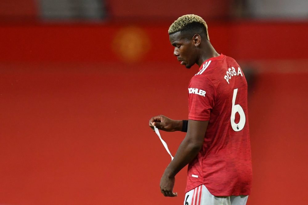 Manchester United's French midfielder Paul Pogba reacts at the end of the English Premier League football match between Manchester United and Arsen...