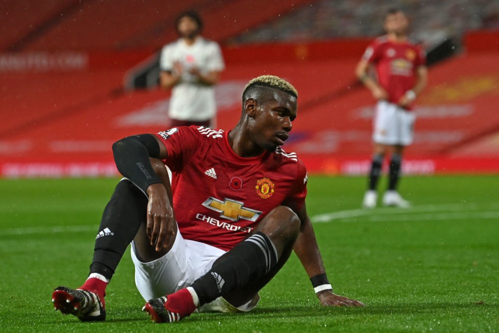 Manchester United's French midfielder Paul Pogba reacts after giving away a penalty during the English Premier League football match between Manchester United and Arsenal at Old Trafford in Manchester, north west England, on November 1, 2020. (Photo by Paul ELLIS / POOL / AFP)