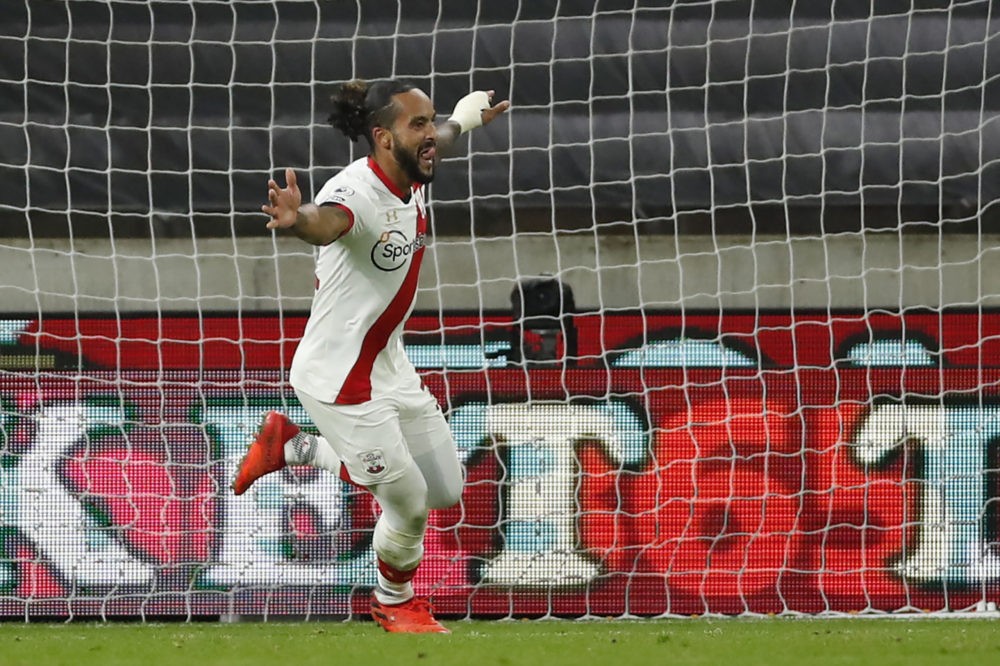 Southampton's English midfielder Theo Walcott celebrates scoring the opening goal of the English Premier League football match between Wolverhampto...