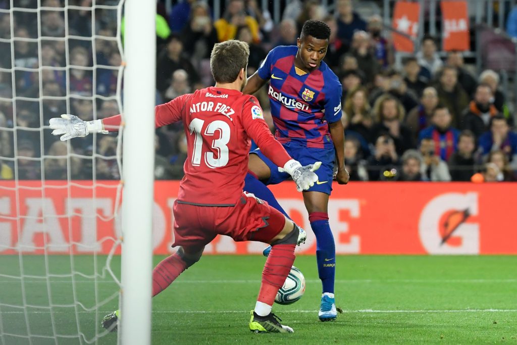 Barcelona media report Arsenal interest in 20yo star 3 Barcelona's Guinea-Bissau forward Ansu Fati (R) challenges Levante's Spanish goalkeeper Aitor Fernandez during the Spanish league football match be tween FC Barcelona and Levante UD at the Camp Nou stadium in Barcelona, on February 2, 2020. (Photo by LLUIS GENE / AFP)