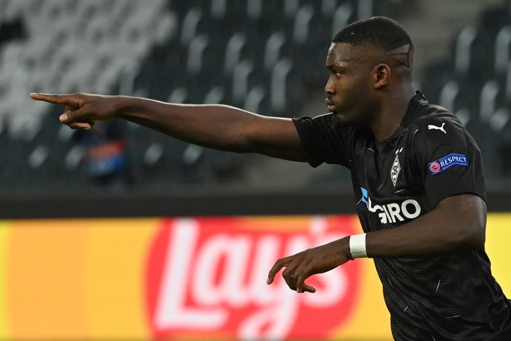 Moenchengladbach's French forward Marcus Thuram celebrates scoring the opening goal during the UEFA Champions League group B football match Borussi...