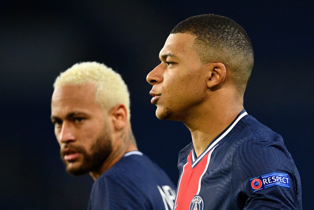 Paris Saint-Germain's Brazilian forward Neymar (L) and Paris Saint-Germain's French forward Kylian MBappe react during the UEFA Champions League Group H second-leg football match between Paris Saint-Germain (PSG) and RB Leipzig at the Parc des Princes stadium in Paris on November 24, 2020. (Photo by FRANCK FIFE / AFP)