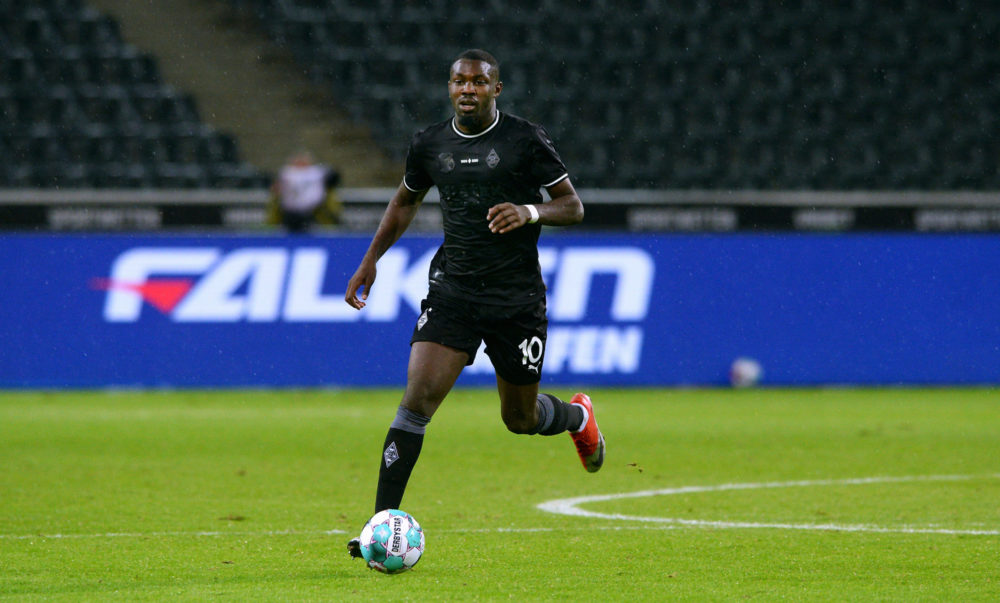 Moenchengladbach's French forward Marcus Thuram controls the ball during the German first division Bundesliga football match Borussia Moenchengladbach vs RB Leipzig, in Moenchengladbach, western Germany, on October 31, 2020. (Photo by UWE KRAFT / POOL / AFP)
